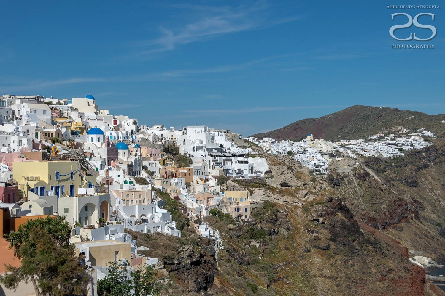 white houses church blue domes oia imerovigli firostefani fira village santorini greece caldera volcanic island