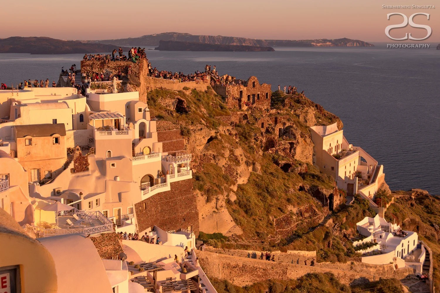 sunset near white houses church blue domes oia imerovigli firostefani fira village santorini greece caldera volcanic island