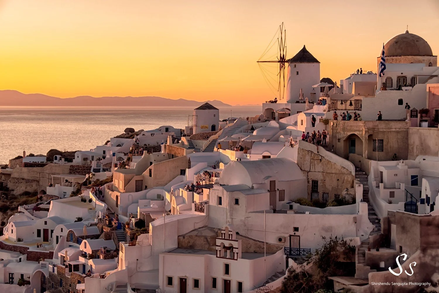sunset near white houses church blue domes oia imerovigli firostefani fira village santorini greece caldera volcanic island