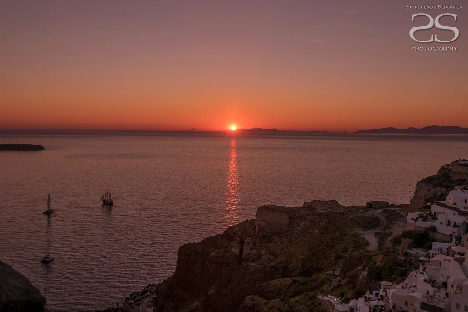 sunset near white houses church blue domes oia imerovigli firostefani fira village santorini greece caldera volcanic island