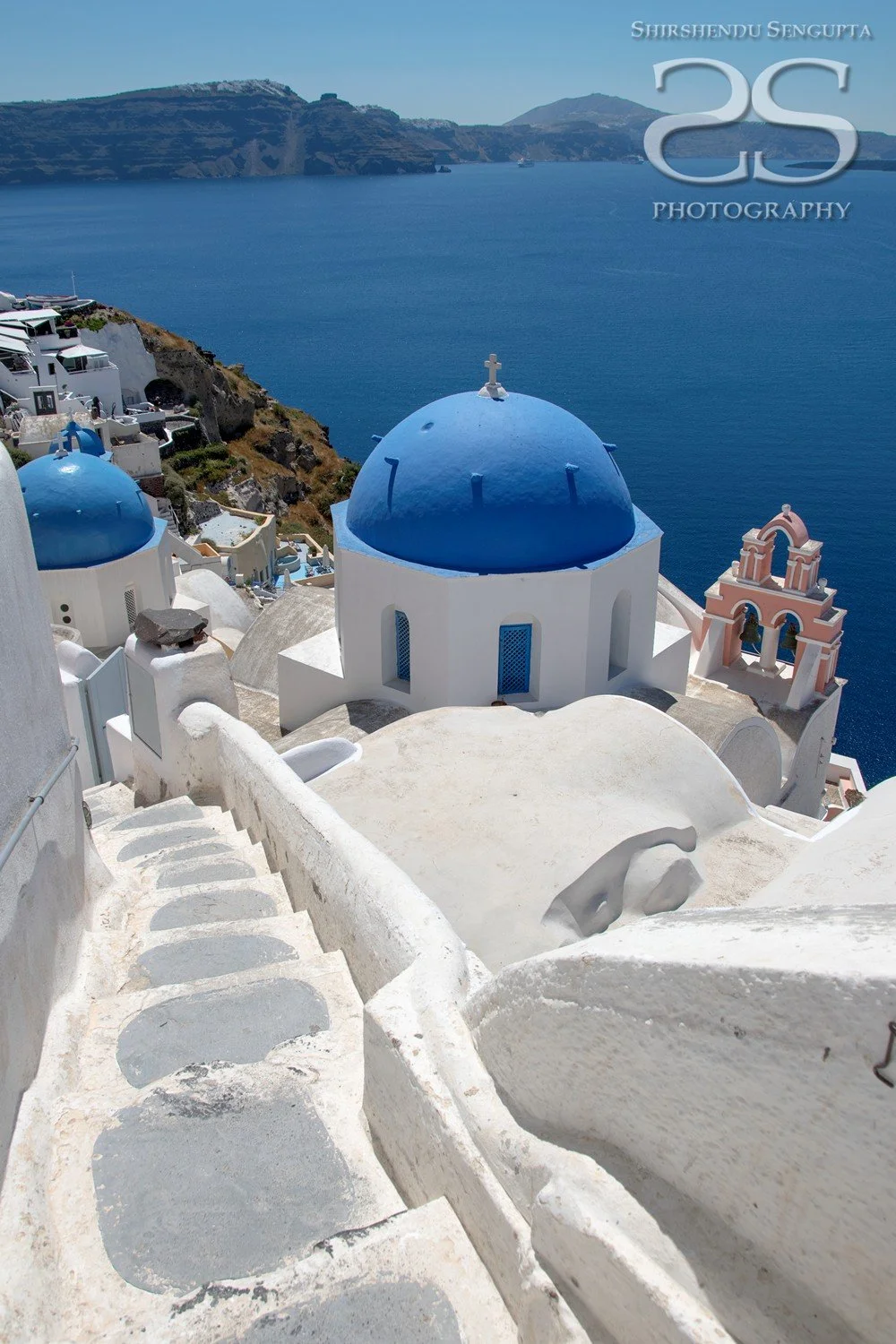 white houses church blue domes oia imerovigli firostefani fira village santorini greece caldera volcanic island