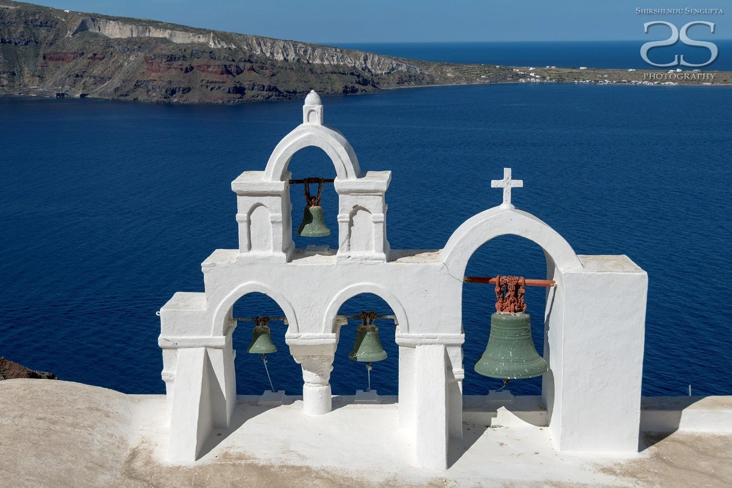 white houses church bell towers blue domes oia imerovigli firostefani fira village santorini greece caldera volcanic island