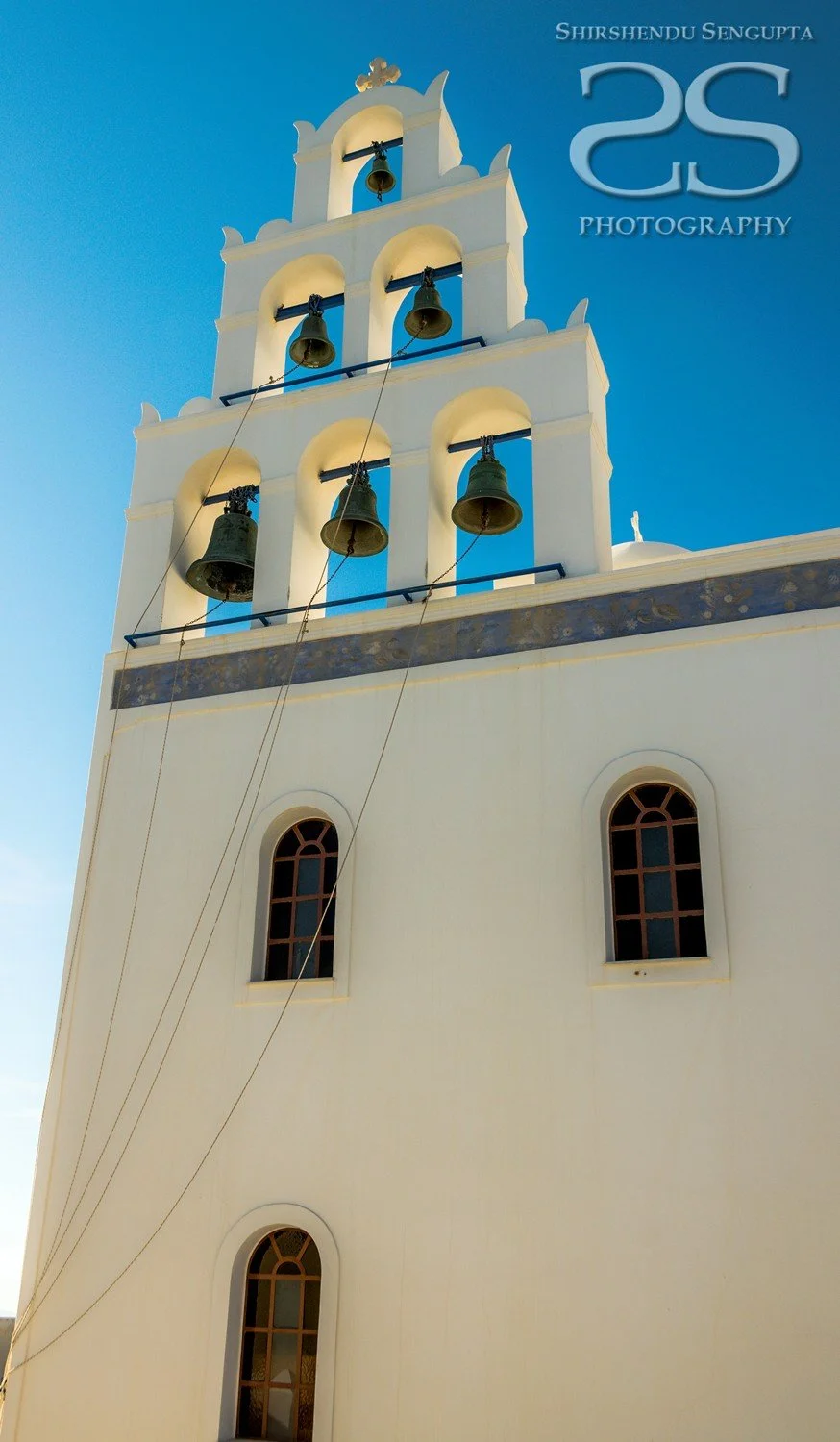 white houses church bell towers blue domes oia imerovigli firostefani fira village santorini greece caldera volcanic island